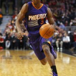 Phoenix Suns guard Brandon Knight (3) dribbles up the court during the second half of an NBA basketball game against the Chicago Bulls in Chicago, on Saturday, Feb. 21, 2015. The Bulls won the game 112-107. (AP Photo/Jeff Haynes)