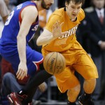 Phoenix Suns' Goran Dragic, right, of Slovenia, steals the ball from Philadelphia 76ers' Furkan Aldemir, of Turkey, during the second half of an NBA basketball game Friday, Jan. 2, 2015, in Phoenix. The Suns defeated the 76ers 112-96. (AP Photo/Ross D. Franklin)
