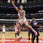 Chicago Bulls forward Mike Dunleavy (34) goes in for a lay up against the Phoenix Suns during the second half of an NBA basketball game in Chicago, on Saturday, Feb. 21, 2015. The Bulls won the game 112-107. (AP Photo/Jeff Haynes)