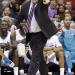 Charlotte Hornets coach Steve Clifford argues a call during the second half of an NBA basketball game against the Phoenix Suns in Charlotte, N.C., Wednesday, Dec. 17, 2014. The Suns won 111-106. (AP Photo/Chuck Burton)