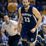 Memphis Grizzlies center Marc Gasol brings the ball up during the first half of the Grizzlies' NBA basketball game against the Phoenix Suns, Wednesday, Nov. 5, 2014, in Phoenix. (AP Photo/Matt York)
