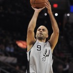 San Antonio Spurs guard Tony Parker, of France, shoots during the first half of an NBA basketball game against the Phoenix Suns on Friday, April 11, 2014, in San Antonio. (AP Photo/Darren Abate)
