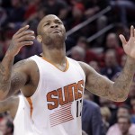 Phoenix Suns forward P.J. Tucker reacts after he was called for a charging foul during the second half of an NBA basketball game against the Portland Trail Blazers in Portland, Ore., Thursday, Feb. 5, 2015. Portland won 108-87. (AP Photo/Don Ryan)
