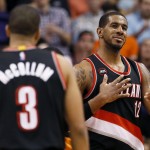 Portland Trail Blazers' LaMarcus Aldridge reacts to a basket against the Phoenix Suns' during the second half of an NBA basketball game, Friday, March 27, 2015, in Phoenix. The Trail Blazers won 87-81. (AP Photo/Matt York)