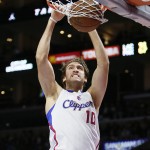 Los Angeles Clippers' Spencer Hawes dunks against the Phoenix Suns during the second half of an NBA basketball game Saturday, Nov. 15, 2014, in Los Angeles. The Clippers won 120-107. (AP Photo/Danny Moloshok)