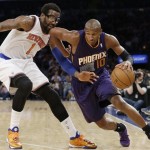 Phoenix Suns' Leandro Barbosa (10) drives past New York Knicks' Amar'e Stoudemire (1) during the second half of an NBA basketball game Monday, Jan. 13, 2014, in New York. The Knicks won the game 98-96. (AP Photo/Frank Franklin II)