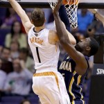  Phoenix Suns' Goran Dragic (1), of Slovenia, scores over Indiana Pacers' Roy Hibbert during the first half of an NBA basketball game, Wednesday, Jan. 22, 2014, in Phoenix. (AP Photo/Ross D. Franklin)
