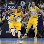 Denver Nuggets guard Andre Iguodala chases down a loose ball in the second half of an NBA basketball game against the Phoenix Suns on Wednesday, April 17, 2013, in Denver. The Nuggets won 118-98. (AP Photo/Chris Schneider)