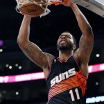 Phoenix Suns' Markieff Morris dunks the ball against the Los Angeles Lakers during the first half of an NBA basketball game on Tuesday, Feb. 12, 2013, in Los Angeles. (AP Photo/Danny Moloshok)