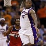 Phoenix Suns' P.J. Tucker (17) looks to pass against the Washington Wizards during the second half of an NBA basketball game, Wednesday, March 20, 2013, in Phoenix. The Wizards won 88-79. (AP Photo/Matt York)