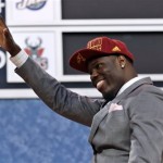 UNLV's Anthony Bennett waves after being selected first overall by the Cleveland Cavaliers in theNBA basketball draft, Thursday, June 27, 2013, in New York. (AP Photo/Kathy Willens)