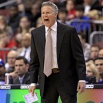 Philadelphia 76ers coach Brett Brown yells at his team as the play against the Phoenix Suns in the first half of an NBA basketball game, Monday, Jan. 27, 2014 in Philadelphia. The Suns won 124-113. (AP Photo/H. Rumph Jr.)