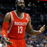 Houston Rockets shooting guard James Harden (13) reacts to a no call in the first quarter during an NBA basketball game against the Phoenix Suns, Sunday, Feb. 23, 2014, in Phoenix. (AP Photo/Rick Scuteri)