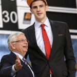 NBA Commissioner David Stern, left, poses with Alex Len, of Ukraine, who was selected by the Phoenix Suns in the first round of the NBA basketball draft, Thursday, June 27, 2013, in New York. (AP Photo/Kathy Willens)