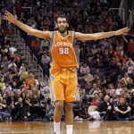 Phoenix Suns center Hamed Haddadi celebrates after making a field goal against the Houston Rockets during the second half of an NBA basketball game Saturday, March 9, 2013, in Phoenix. The Suns won 107-105. (AP Photo/Paul Connors)
