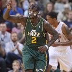  Utah Jazz's Marvin Williams (2) celebrates as he runs up the court after scoring against the Phoenix Suns in the first half during an NBA basketball game Friday, Nov. 29, 2013, in Salt Lake City. (AP Photo/Rick Bowmer)