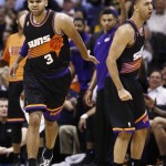 Phoenix Suns' Kendall Marshall, right celebrates his made jump shot against the Los Angeles Lakers with teammate Jared Dudley (3) in the first half of an NBA basketball game on Monday, March 18, 2013, in Phoenix. (AP Photo/Ross D. Franklin)