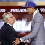 NBA Commissioner David Stern, left, shakes hands with Syracuse's Michael Carter-Williams, who was selected by the Philadelphia 76ers in the first round of the NBA basketball draft, Thursday, June 27, 2013, in New York. (AP Photo/Kathy Willens)