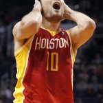 Houston Rockets forward Carlos Delfino, of Argentina, reacts after being called for a foul against the Phoenix Suns during the second half of an NBA basketball game Saturday, March 9, 2013, in Phoenix. The Suns won 107-105. (AP Photo/Paul Connors)
