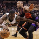Boston Celtics forward Jeff Green, left, drives to the basket around Phoenix Suns forward P.J. Tucker in the first half of an NBA basketball game, Friday, Feb. 22, 2013, in Phoenix. (AP Photo/Paul Connors)