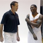 Phoenix Suns head coach Jeff Hornacek, left, talks with guard Eric Bledsoe during the team's NBA basketball media day on Monday, Sept. 30, 2013, in Phoenix. (AP Photo/Ross D. Franklin)