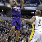 Phoenix Suns guard Gerald Green, left, pulls up to shoot over Indiana Pacers forward David West in the first half of an NBA basketball game in Indianapolis, Thursday, Jan. 30, 2014. (AP Photo)