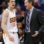  Phoenix Suns' Jeff Hornacek, right, talks with Goran Dragic, left, of Slovenia, during the first half of an NBA basketball game against the Golden State Warriors, Saturday, Feb. 8, 2014, in Phoenix. (AP Photo/Ross D. Franklin)
