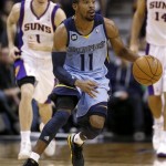 Memphis Grizzlies' Mike Conley brings the ball up against the Phoenix Suns during the first half of an NBA basketball game, Sunday, Jan. 6, 2013, in Phoenix. (AP Photo/Matt York)
