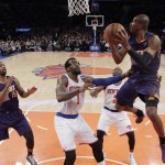 Phoenix Suns' Leandro Barbosa, right, of Brazil, drives past New York Knicks' Amar'e Stoudemire (1) to score during the second half of an NBA basketball game, Monday, Jan. 13, 2014, in New York. The Knicks won the game 98-96. (AP Photo/Frank Franklin II)
