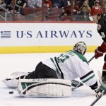  Phoenix Coyotes' Antoine Vermette (50) scores a goal against Dallas Stars' Kari Lehtonen, of Finland, during the second period of an NHL hockey game, Tuesday, Feb. 4, 2014, in Glendale, Ariz. (AP Photo/Ross D. Franklin)