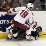 Los Angeles Kings right wing Dustin Brown, bottom, is checked by 
Phoenix Coyotes right wing Shane Doan during the first period of 
Game 4 of the NHL hockey Stanley Cup Western Conference finals in 
Los Angeles, Sunday, May 20, 2012. (AP Photo/Jae C. Hong)