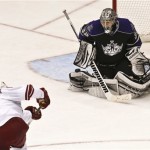 Phoenix Coyotes' Rob Klinkhammer, left, scores a goal against Jonathan Quick (32) in the third period during an NHL hockey game on Tuesday, March 12, 2013, in Glendale, Ariz. The Coyotes defeated the Kings 5-2. (AP Photo/Ross D. Franklin)