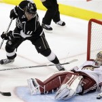 Phoenix Coyotes goalie Mike Smith, right, stops a shot as Los Angeles 
Kings center Anze Kopitar, of Slovenia, watches during the second 
period of Game 4 of the NHL hockey Stanley Cup Western Conference 
finals in Los Angeles, Sunday, May 20, 2012. (AP Photo/Jae C. Hong)