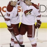 Phoenix Coyotes center Martin Hanzal (11) celebrates a goal with teammate Lauri Korpikoski (28) during the second period of an NHL hockey game against the Dallas Stars on Saturday, Jan. 19, 2013, in Dallas. (AP Photo/LM Otero)
