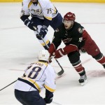 Phoenix Coyotes right wing Shane Doan (19) carries the puck in the second period against the Nashville Predators during an NHL hockey game on Monday, Jan. 28, 2013, in Glendale, Ariz. (AP Photo/Rick Scuteri)