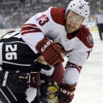 Phoenix Coyotes left wing Ray Whitney, right, tangles with Los Angeles 
Kings defenseman Slava Voynov, of Russia, during Game 4 of the NHL 
hockey Stanley Cup Western Conference finals, Sunday, May 20, 2012, 
in Los Angeles. (AP Photo/Mark J. Terrill)