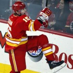 Calgary Flames' Tim Jackman celebrates his goal during first period of an NHL hockey game against the Phoenix Coyotes in Calgary, Alberta, Sunday, Feb. 24, 2013. (AP Photo/The Canadian Press, Jeff McIntosh)