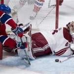 Phoenix Coyotes goalie Mike Smith stops a shot by Montreal Canadiens' Brendan Gallagher during the third period of an NHL hockey game Tuesday, Dec. 17, 2013, in Montreal. The Canadiens won 3-1. (AP Photo/The Canadian Press, Paul Chiasson)