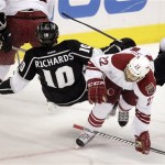 Los Angeles Kings center Mike Richards, left, collides with Phoenix 
Coyotes center Daymond Langkow during the first period of Game 4 of 
the NHL hockey Stanley Cup Western Conference finals in Los Angeles, 
Sunday, May 20, 2012. (AP Photo/Jae C. Hong)