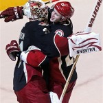 Phoenix Coyotes goalie Chad Johnson (31) celebrates with Oliver Ekman-Larsson (23) of Sweden, after shutting out the Nashville Predators 4-0 in his first start as a Coyote during an NHL hockey game on Monday, Jan. 28, 2013, in Glendale, Ariz. (AP Photo/Rick Scuteri)