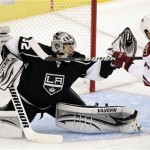 Los Angeles Kings goalie Jonathan Quick, left, stops a shot as Phoenix 
Coyotes left wing Taylor Pyatt watches during the second period of 
Game 4 of the NHL hockey Stanley Cup Western Conference finals in 
Los Angeles, Sunday, May 20, 2012. (AP Photo/Jae C. Hong)
