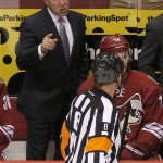Phoenix Coyotes' Dave Tippett, left, yells at referee Dave Jackson after officials disallowed a goal the Coyotes scored during the third period of an NHL hockey game against the Colorado Avalanche Thursday, Nov. 21, 2013, in Glendale, Ariz. The Avalanche defeated the Coyotes 4-3. (AP Photo/Ross D. Franklin)
