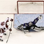 Phoenix Coyotes' Shane Doan (19) scores a goal against Los Angeles Kings' Jonathan Quick (32) in the first period during an NHL hockey game on Tuesday, March 12, 2013, in Glendale, Ariz. The Coyotes defeated the Kings 5-2. (AP Photo/Ross D. Franklin)