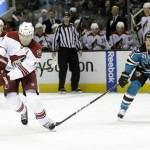 Phoenix Coyotes center Martin Hanzal (11), of the Czech Republic, is chased by San Jose Sharks left wing T.J. Galiardi (21) during the second period of an NHL hockey game in San Jose, Calif., Saturday, Feb. 9, 2013. (AP Photo/Marcio Jose Sanchez)
