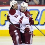 Phoenix Coyotes' Antoine Vermette, left, celebrates his goal with teammate Mikkel Boedker, from Denmark, during the first period of an NHL hockey game against the Calgary Flames in Calgary, Alberta, Friday, April 12, 2013. (AP Photo/The Canadian Press, Larry MacDougal)