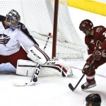 Phoenix Coyotes' Steve Sullivan (26) scores a goal on Columbus Blue Jackets' Steve Mason to record a hat trick, his final goal during the third period in an NHL hockey game Wednesday, Jan. 23, 2013, in Glendale, Ariz. The Coyotes defeated the Blue Jackets 5-1.(AP Photo/Ross D. Franklin)