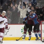 Colorado Avalanche left wing Patrick Bordeleau (58) celebrates his goal with Avalanche left wing Cody McLeod (55) during the second period of an NHL hockey game in Denver on Tuesday, Dec. 10, 2013. Phoenix Coyotes right wing Jordan Szwarz (29) skates away from the play. (AP Photo/Joe Mahoney)
