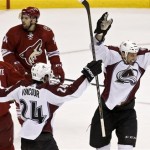 Colorado Avalanche's Patrick Bordeleau, right, celebrates his goal against the Phoenix Coyotes with teammate Tomas Vincour (24), of the Czech Republic, as Cyotes' Paul Bissonnette, left, and Chris Conner (14) look back at the goal during the first period in an NHL hockey game, on Friday, April 26, 2013, in Glendale, Ariz. (AP Photo/Ross D. Franklin)