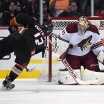 Arizona Coyotes goalie Mike Smith, right, stops a shot by Anaheim Ducks right wing Devante Smith-Pelly during the shootout in an NHL hockey game, Friday, Nov. 7, 2014, in Anaheim, Calif. The Coyotes won 3-2. (AP Photo/Mark J. Terrill)