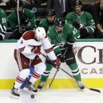 Arizona Coyotes' Keith Yandle (3) and Ales Hemsky (83), of the Czech Republic, compete for control of the puck in the third period of an NHL hockey game, Thursday, Nov. 20, 2014, in Dallas. The Stars won 3-1. (AP Photo/Tony Gutierrez)